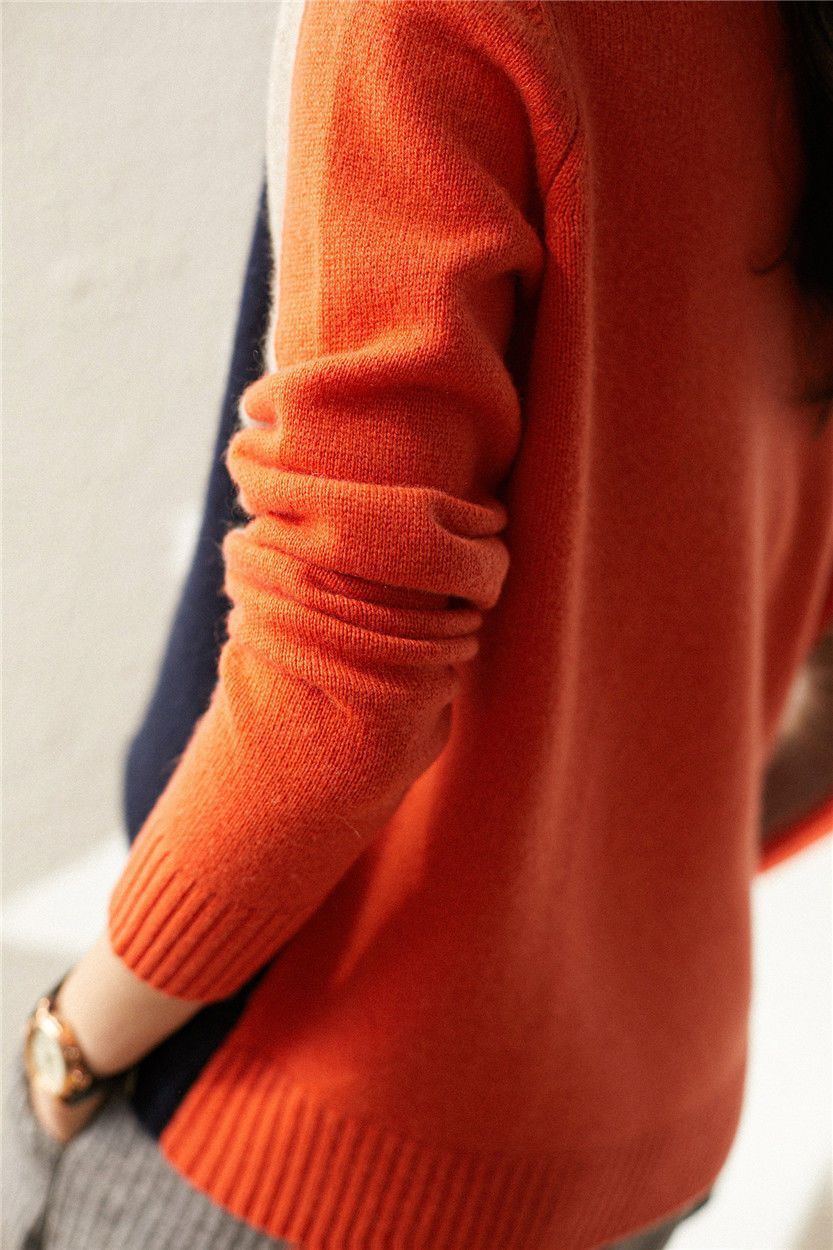 Pull à rayures rétro bleu marine et orange