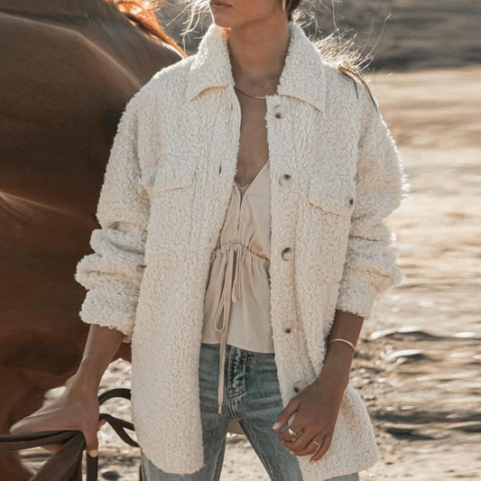 Veste tricotée à manches longues avec poches à boutons et revers